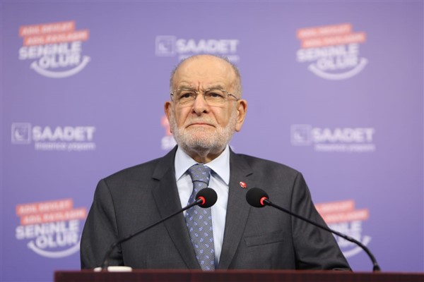 Karamollaoğlu, Urumçi katliamının yıl dönümünde hayatını kaybedenleri andı<